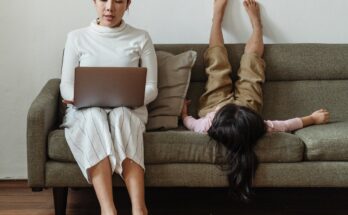 photo of mother working at home