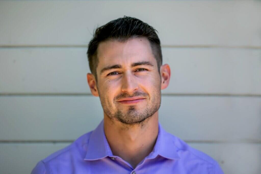 man in blue button up shirt